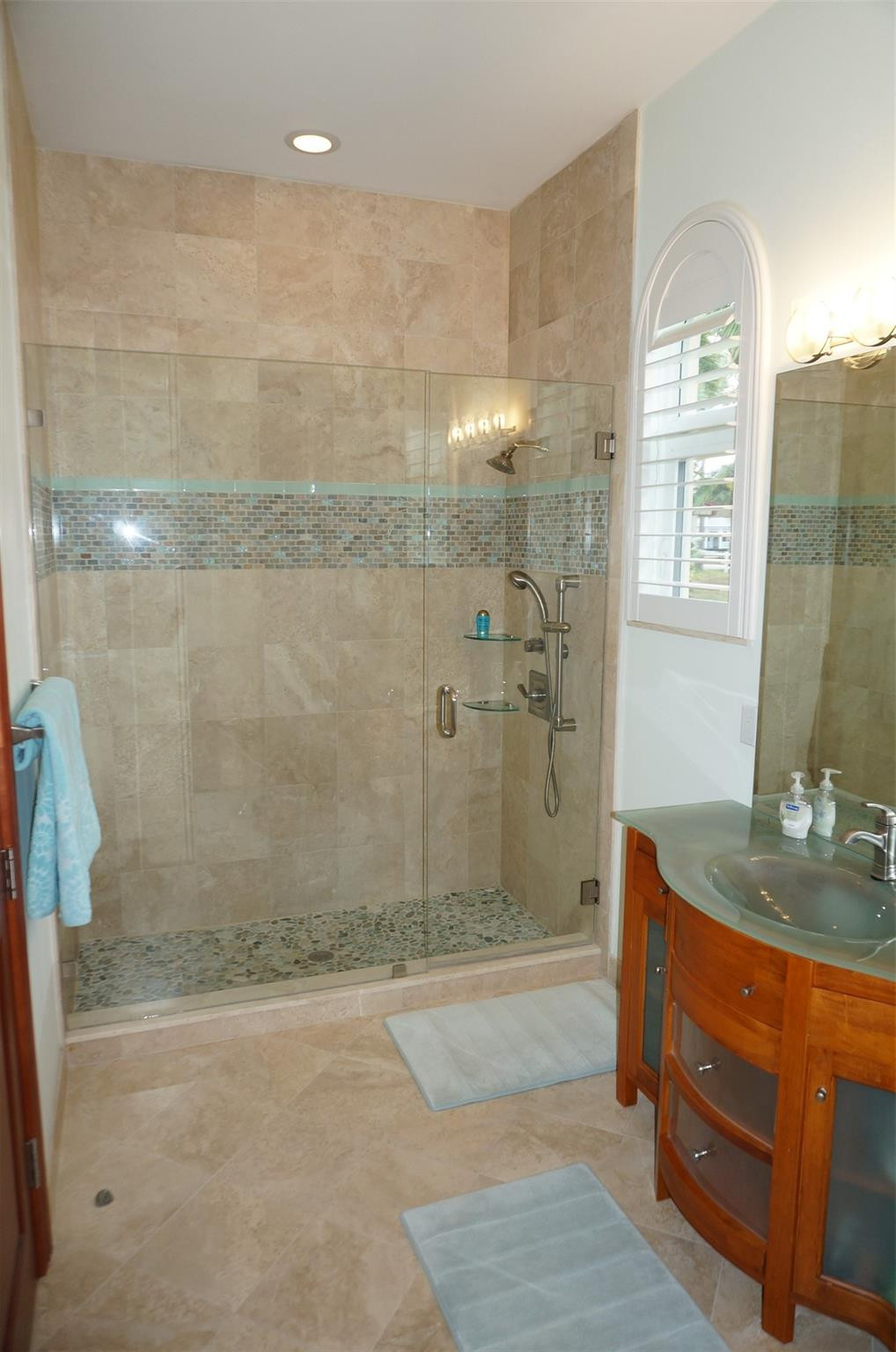 650 East Rambling Drive Wellington, FL 33414 - Photo 43 of 75 a bathroom with a granite countertop sink a shower and a mirror