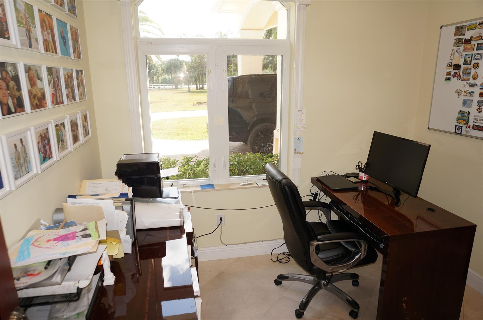 650 East Rambling Drive Wellington, FL 33414 - Photo 52 of 75 a workspace with furniture and a window
