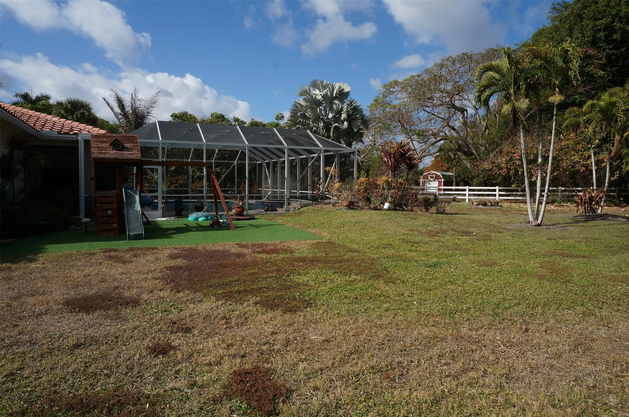 650 East Rambling Drive Wellington, FL 33414 - Photo 62 of 75 a view of a yard in front of house