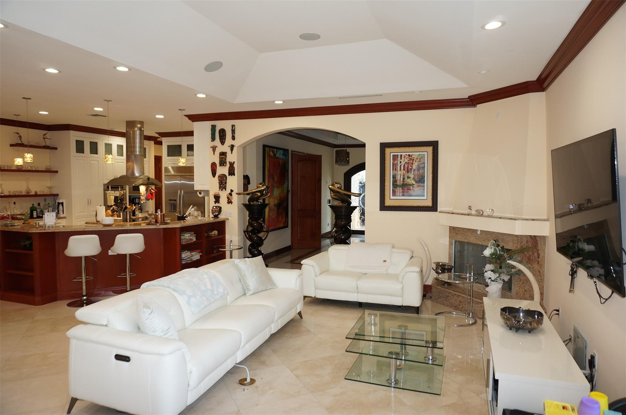 650 East Rambling Drive Wellington, FL 33414 - Photo 7 of 75 a living room with furniture and a flat screen tv