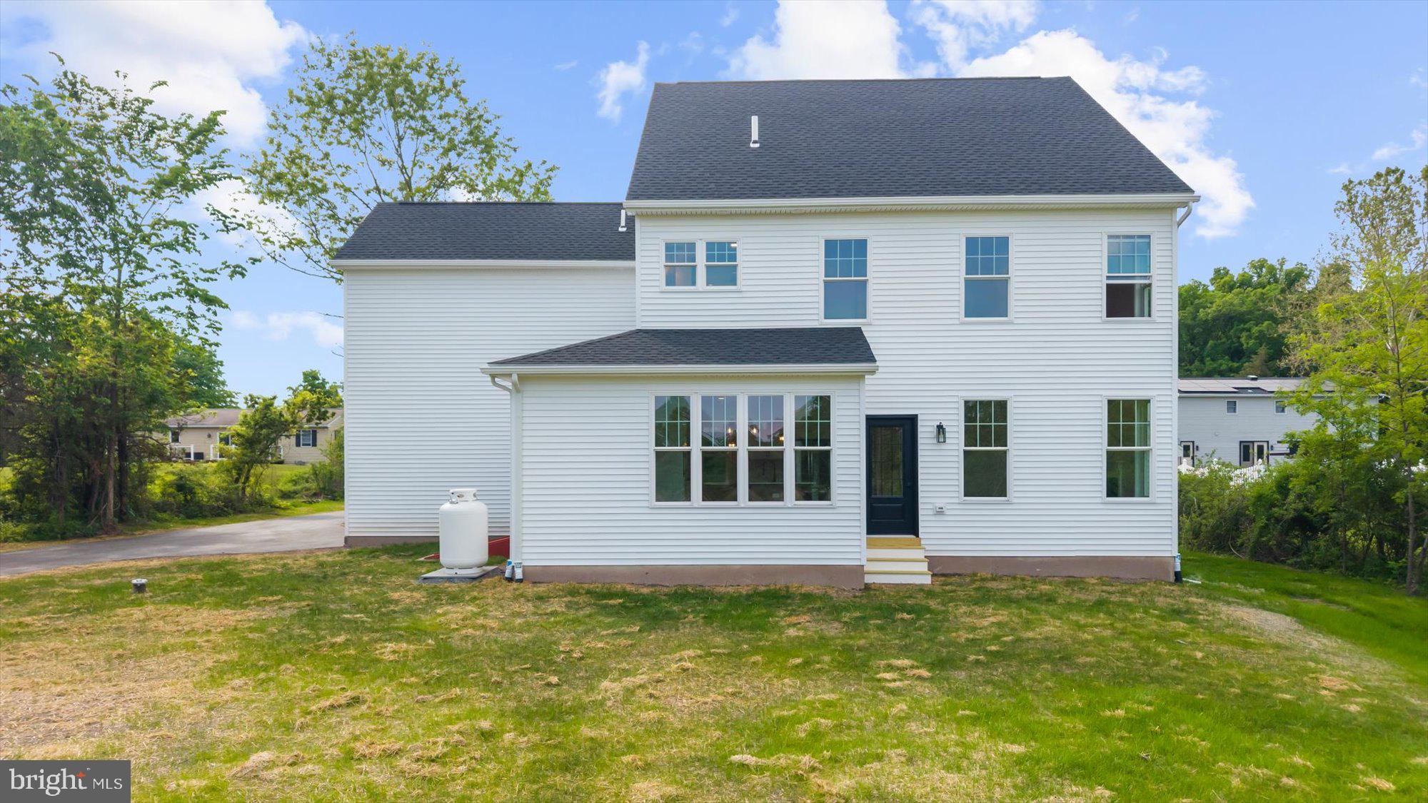 394 Renninger Road Perkiomenville, PA 18074 - Photo 10 of 41 a front view of a house with a yard
