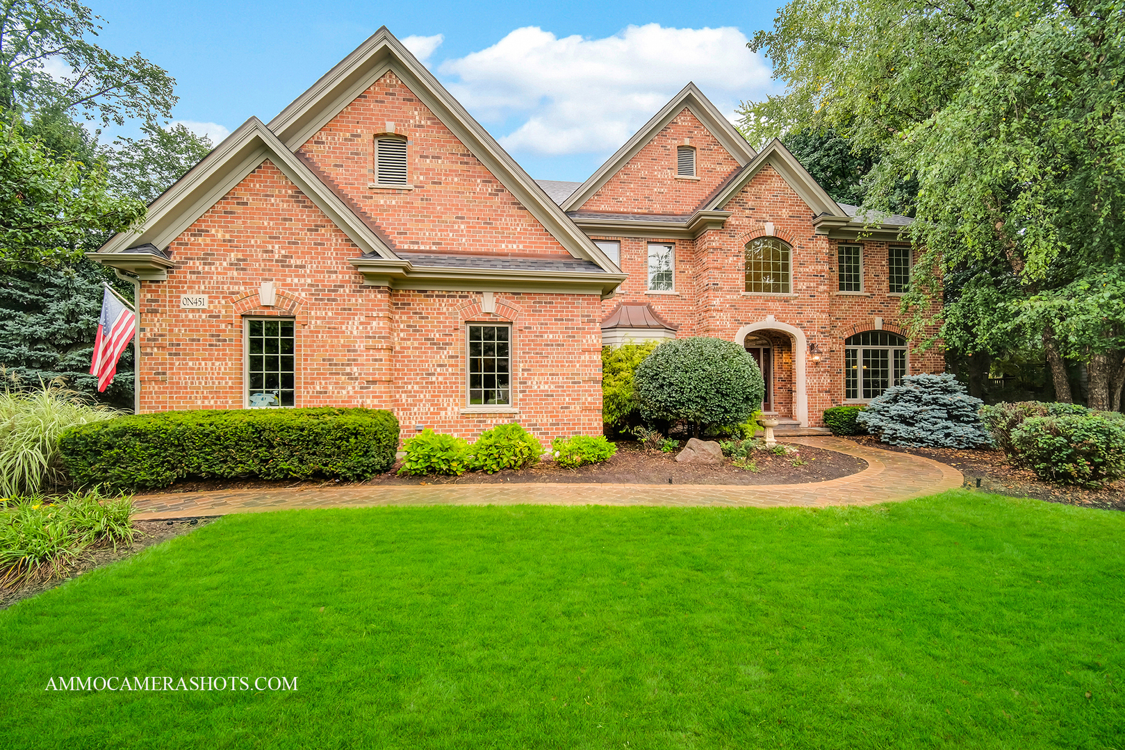 N451 Peter Road Winfield, IL 60190 - Photo 2 of 48 a front view of a house with a yard and garage