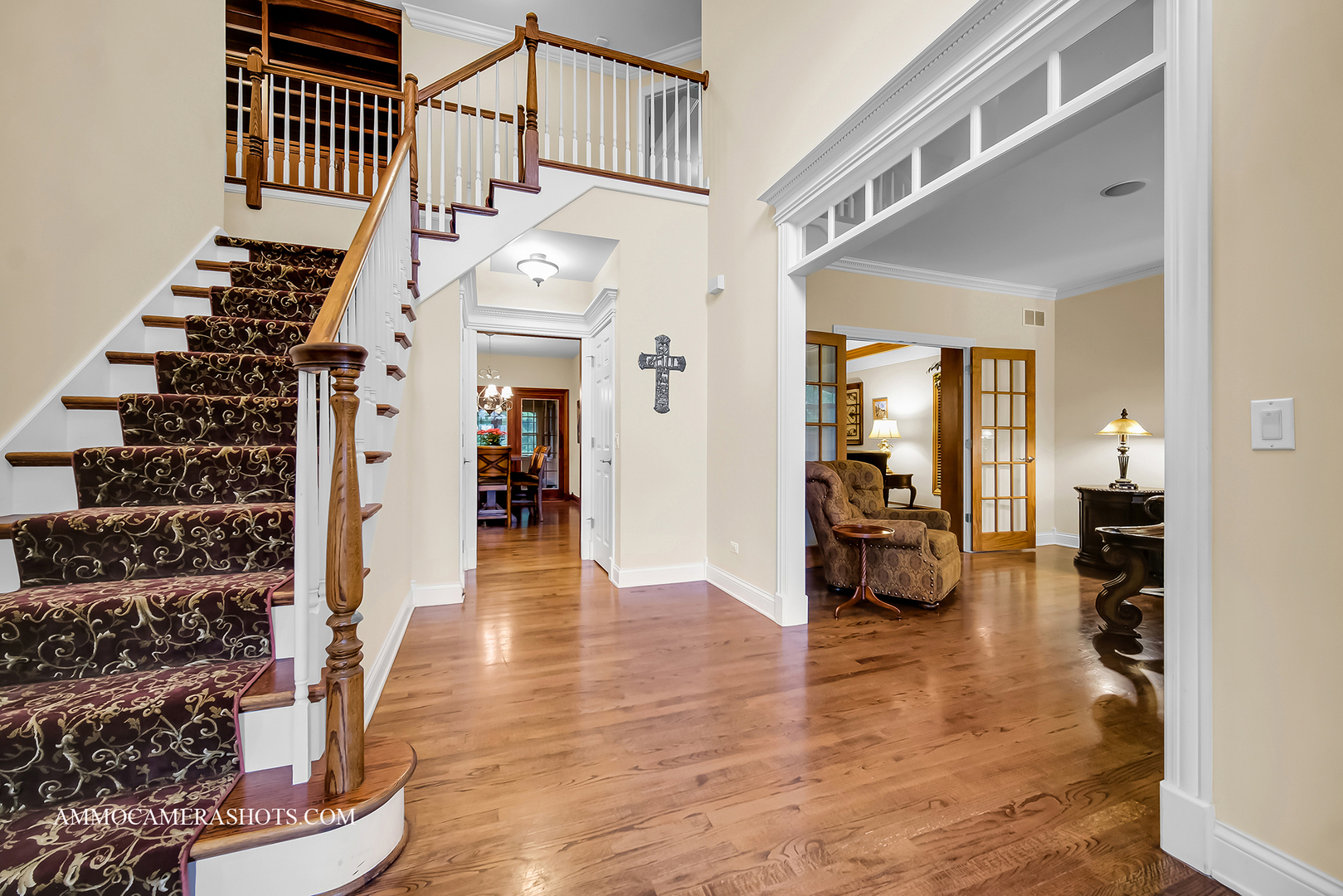 N451 Peter Road Winfield, IL 60190 - Photo 7 of 48 a view of a hallway with wooden floor and staircase