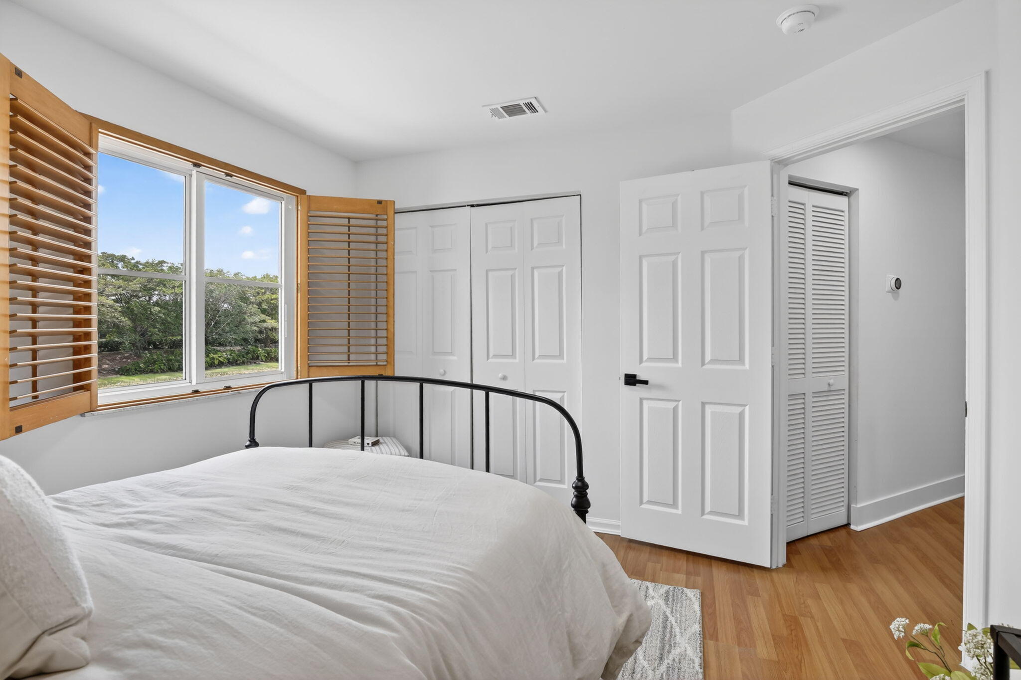 4299 Laurel Ridge Circle Weston, FL 33331 - Photo 57 of 103 a bedroom with a bed and a large window