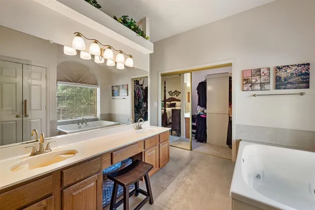 a view of a livingroom with furniture and workspace