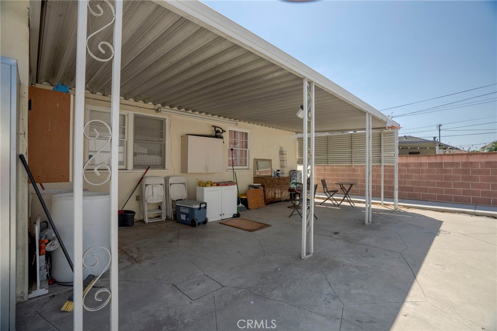 9727 Glandon Street Bellflower, CA 90706 - Photo 16 of 40 a view of a porch with furniture