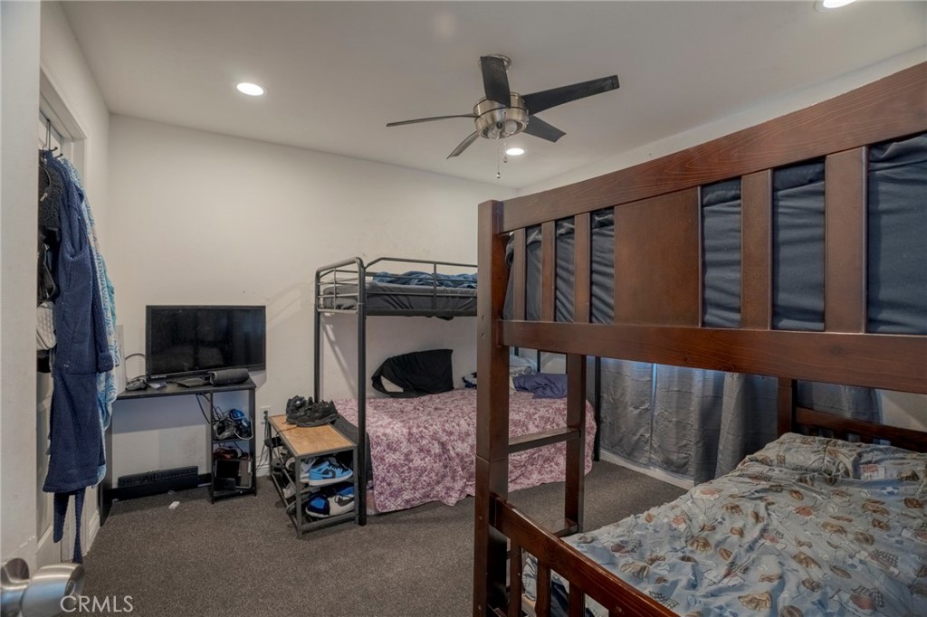 9727 Glandon Street Bellflower, CA 90706 - Photo 26 of 40 a view of a livingroom with furniture and staircase