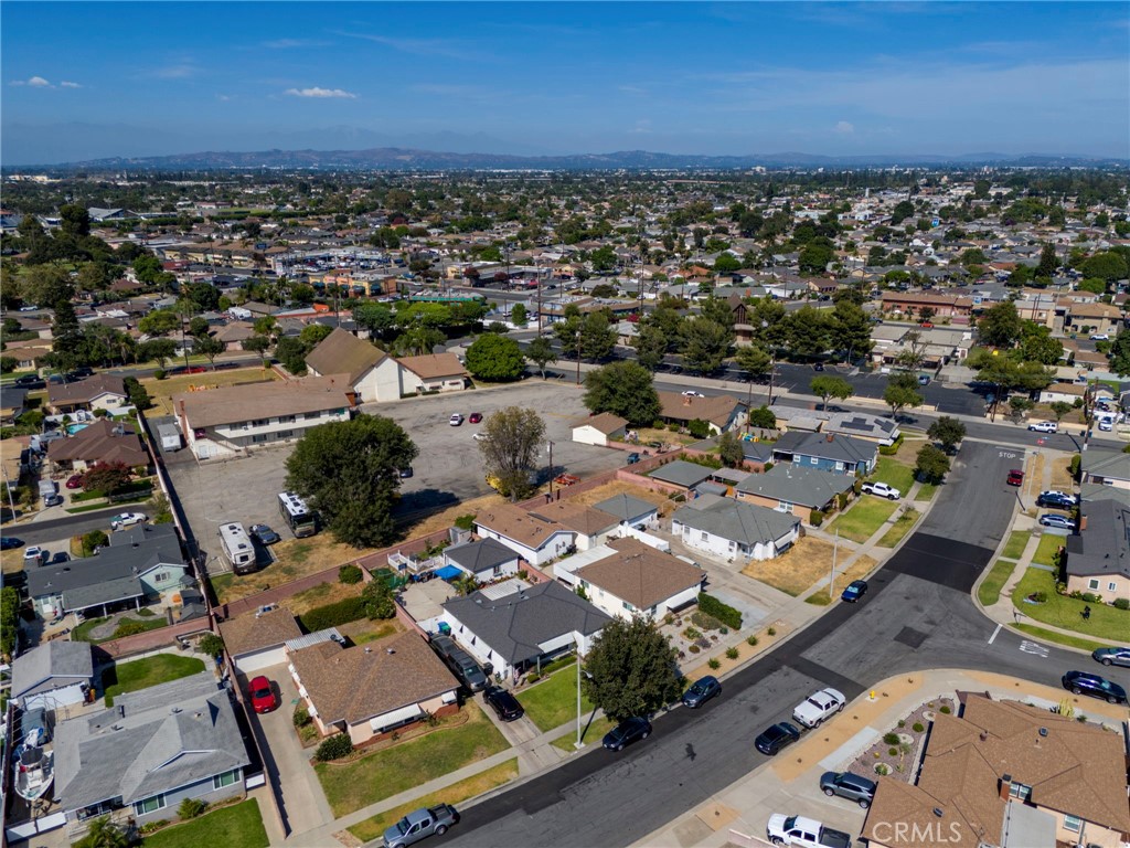 9727 Glandon Street Bellflower, CA 90706 - Photo 4 of 40 an aerial view of residential houses with outdoor space
