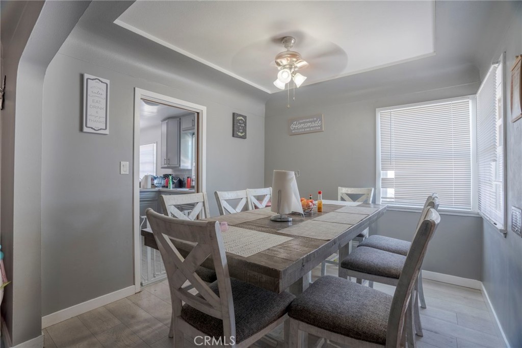 9727 Glandon Street Bellflower, CA 90706 - Photo 9 of 40 a view of a dining room with furniture and chandelier