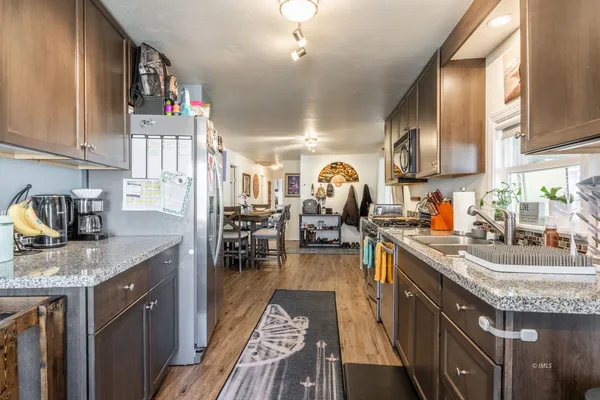 a kitchen with granite countertop lots of counter top space
