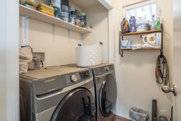 a utility room with dryer and washer