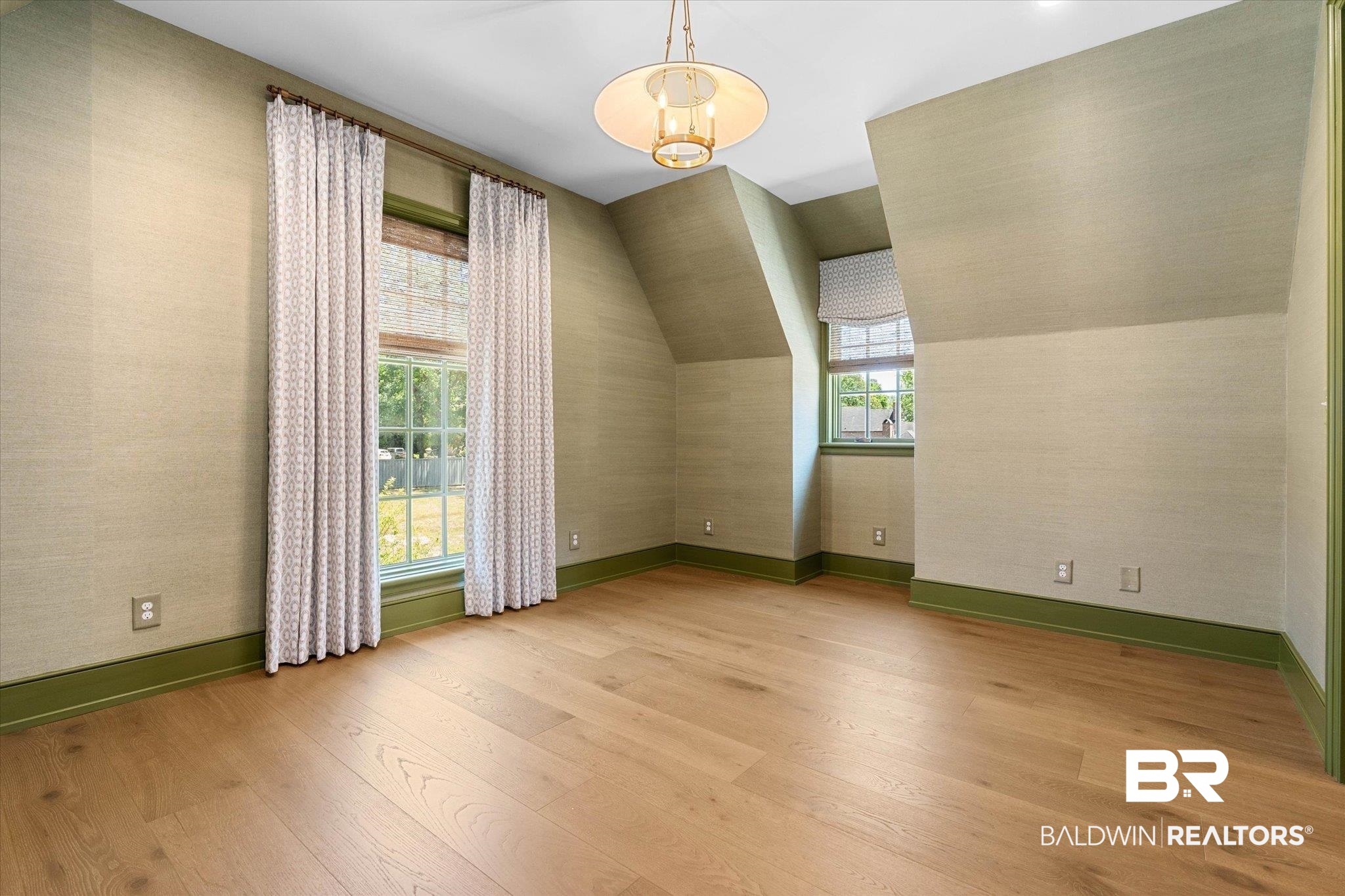 3 Canterbury Park Mobile, AL 36608 - Photo 27 of 43 Bonus room featuring light wood finished floors, a chandelier, and baseboards