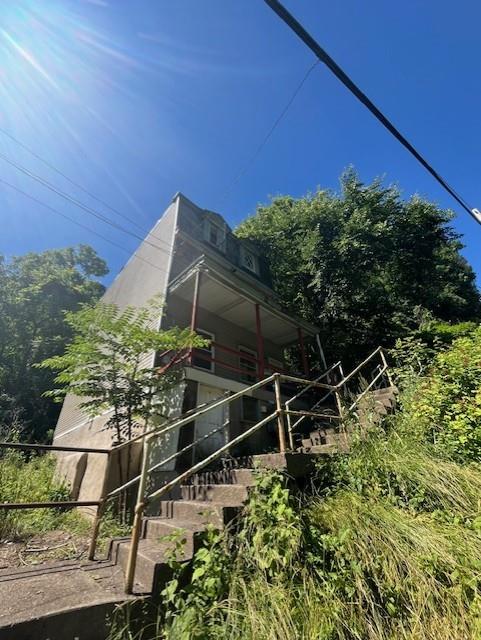 635 Rising Main Avenue Pittsburgh, PA 15212 - Photo 34 of 34 a backyard of a house with lots of green space