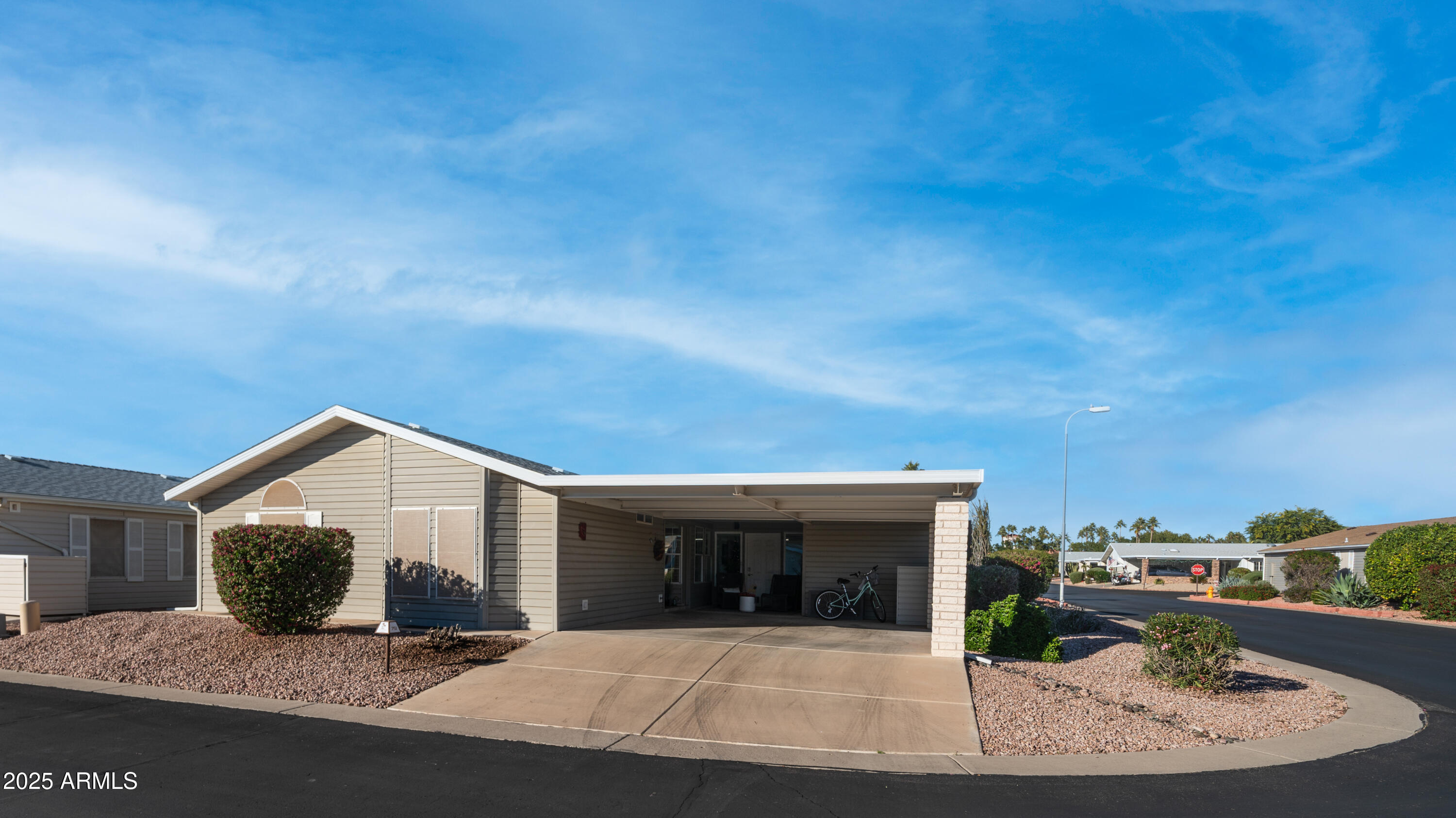 2550 South Ellsworth Road, Unit 751 Mesa, AZ 85209 - Photo 26 of 27 a view of a house with a yard