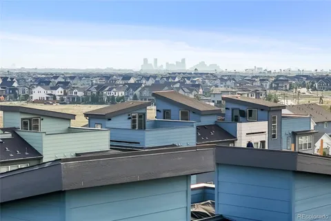 a view of a city with tall buildings