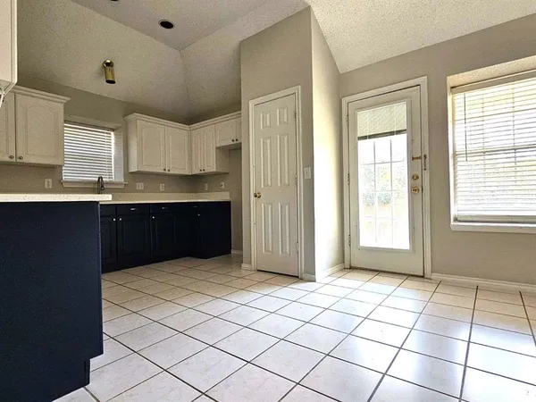a view of kitchen with windows