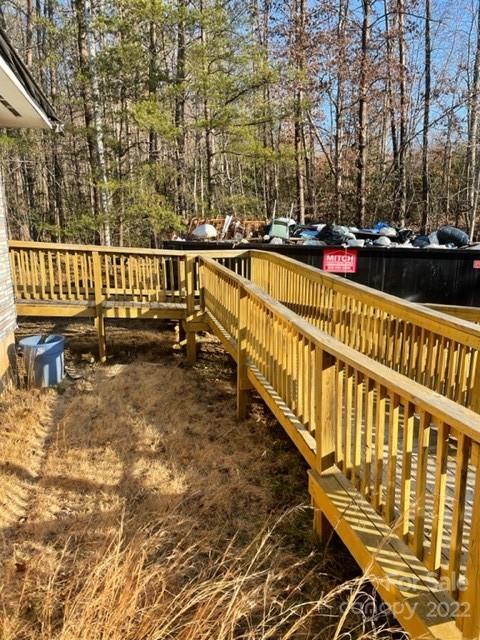860 Padgett Road Union Mills, NC 28167 - Photo 4 of 14 a view of a balcony with wooden floor and fence