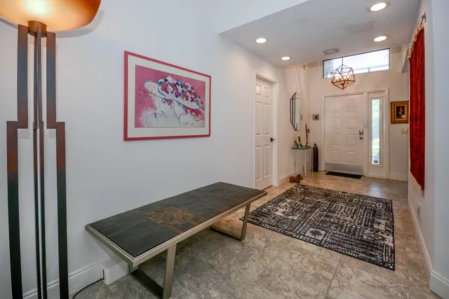 a living room with a rug