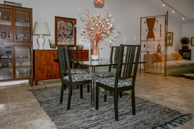 a view of a livingroom with furniture and window