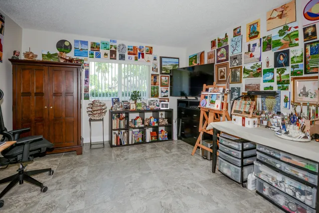 a room with furniture and a flat screen tv