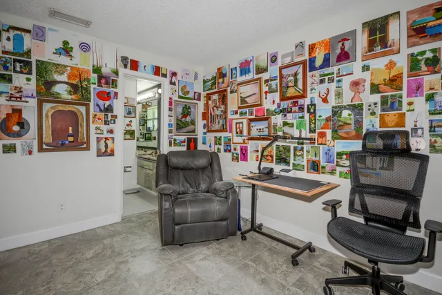 a room with furniture and a book shelf