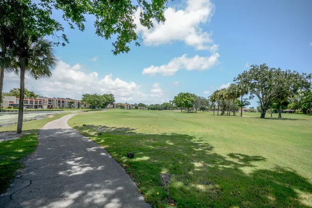a view of a lake with a big yard