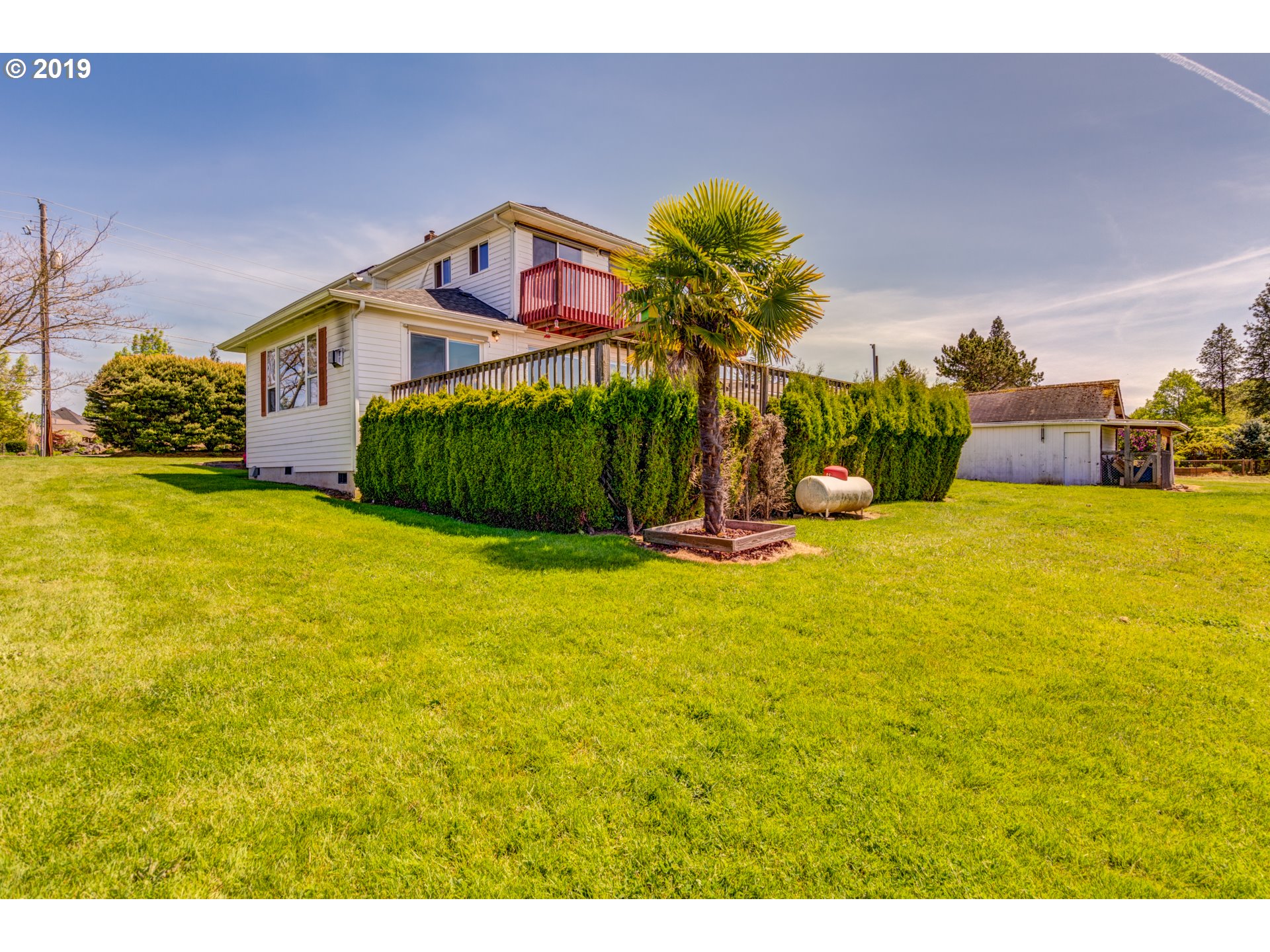 823 South Hillhurst Road Ridgefield, WA 98642 - Photo 29 of 31 a view of a house with a yard