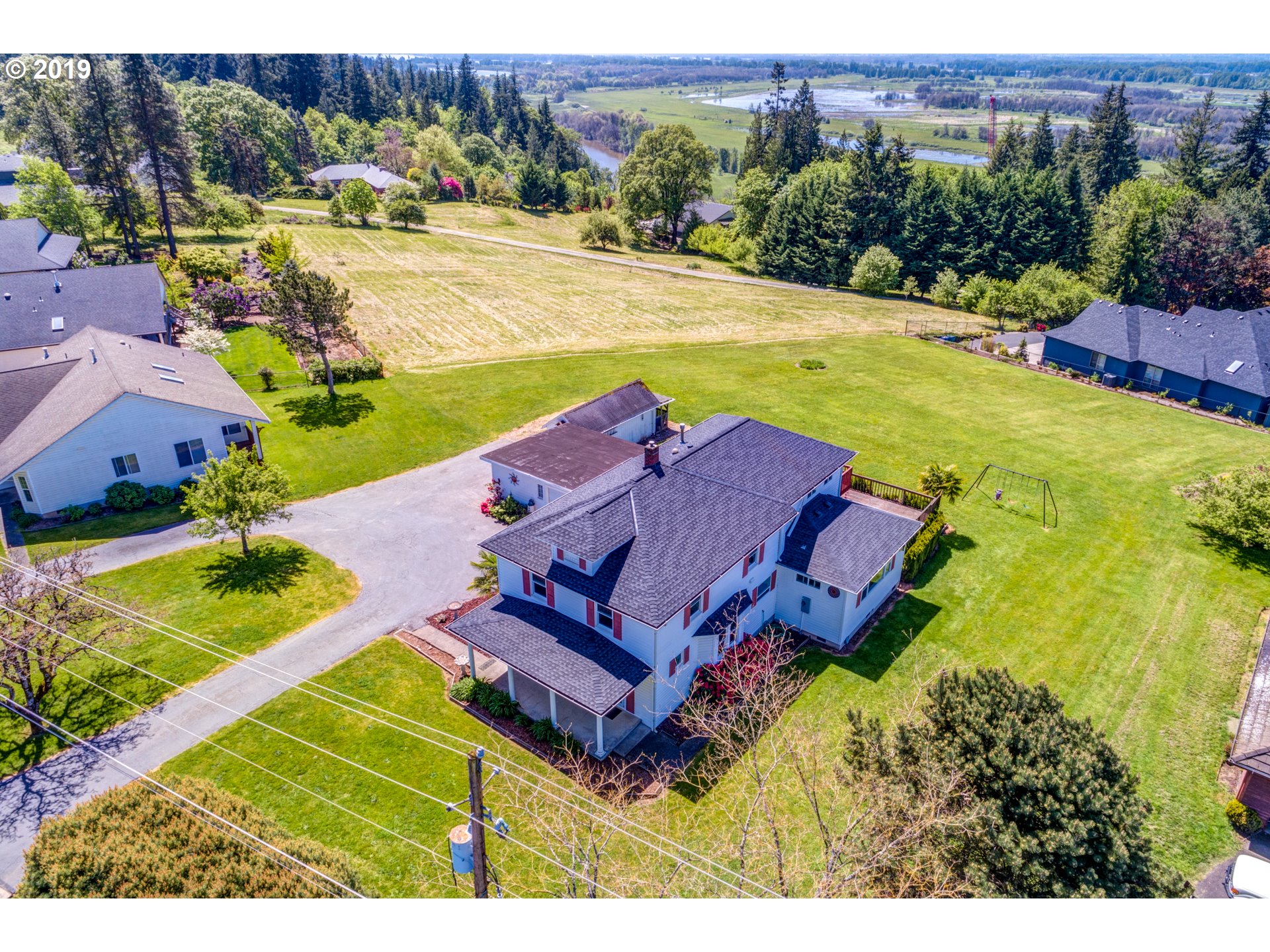 823 South Hillhurst Road Ridgefield, WA 98642 - Photo 4 of 31 a view of a city with lawn chairs