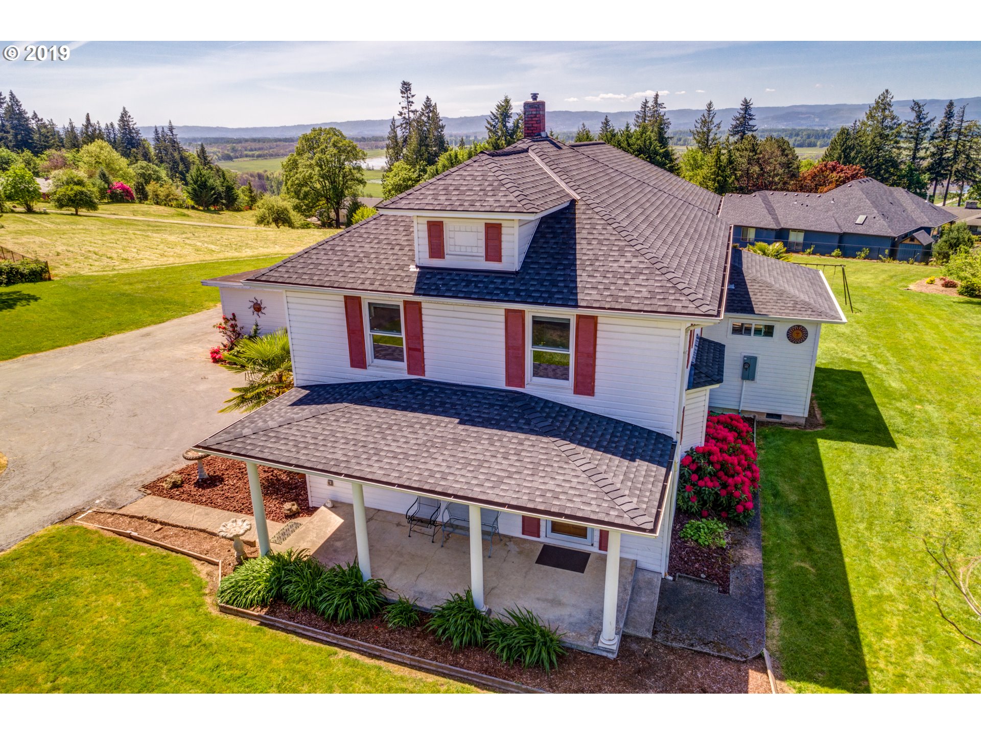 823 South Hillhurst Road Ridgefield, WA 98642 - Photo 8 of 31 an aerial view of residential houses with outdoor space and ocean view