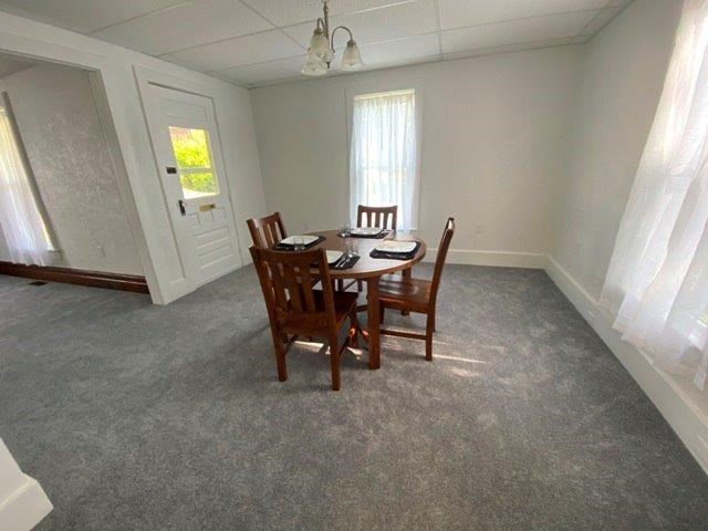 200 Park Avenue Warren, PA 16365 - Photo 3 of 12 a view of a dining room with furniture and chandelier