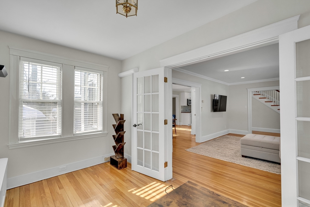 10 Dexter Road Lexington, MA 02420 - Photo 9 of 35 a view of livingroom with hardwood floor and window