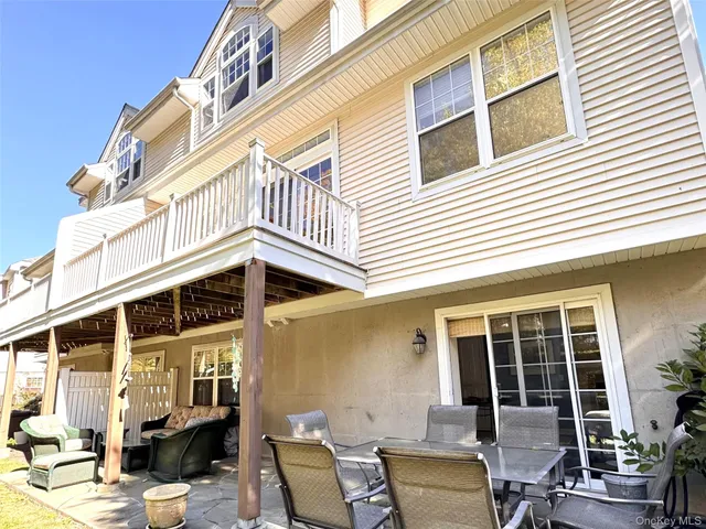 a front view of a building and outdoor seating