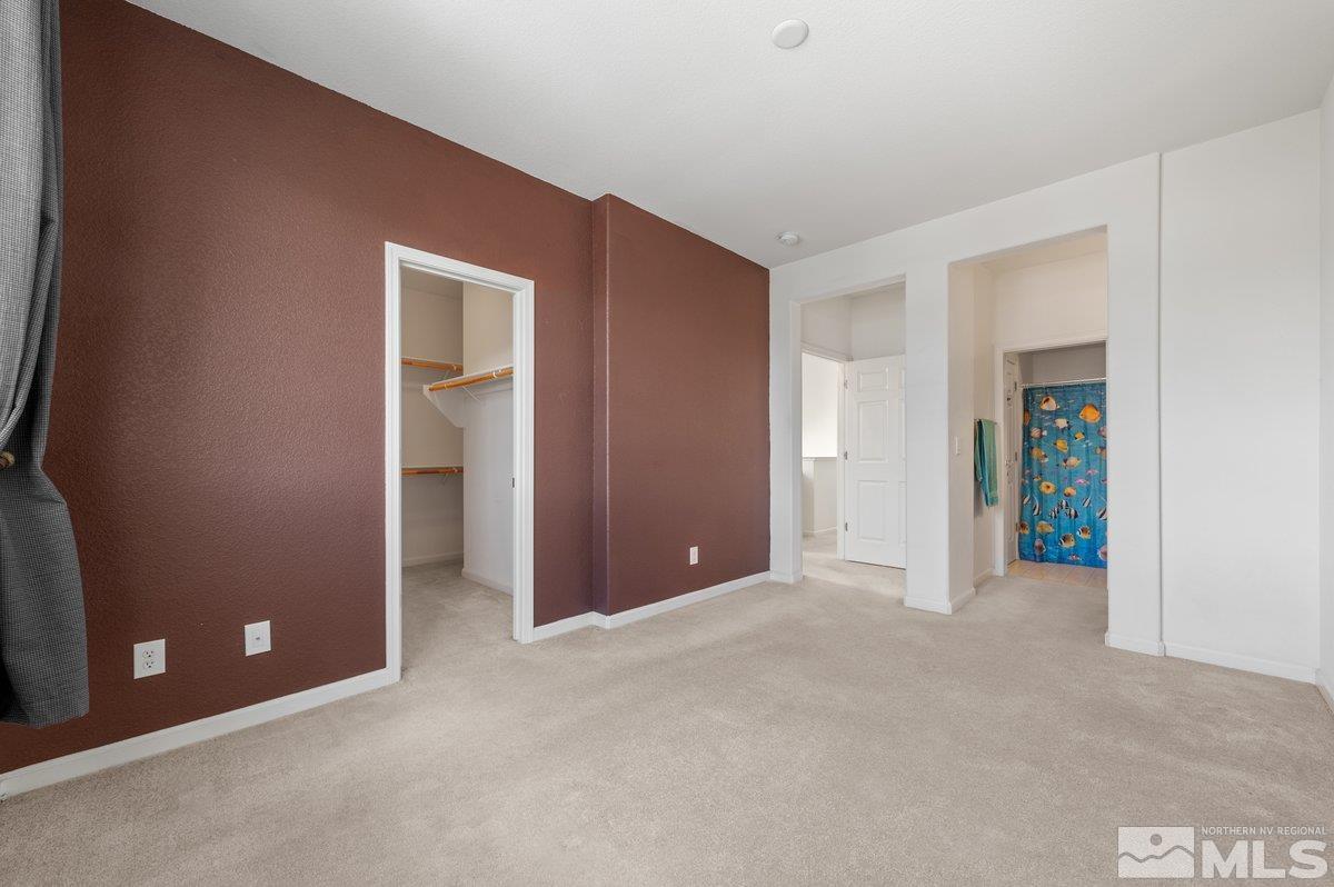 2160 Stanhope Lane Reno, NV 89502 - Photo 21 of 31 a view of an empty room with yellow walls