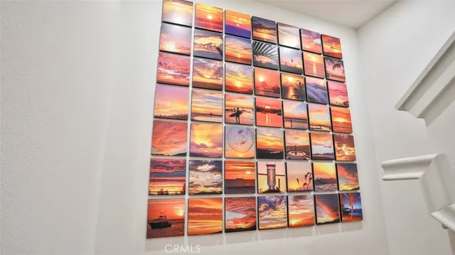 a kitchen with stainless steel appliances kitchen island granite countertop a sink and a refrigerator