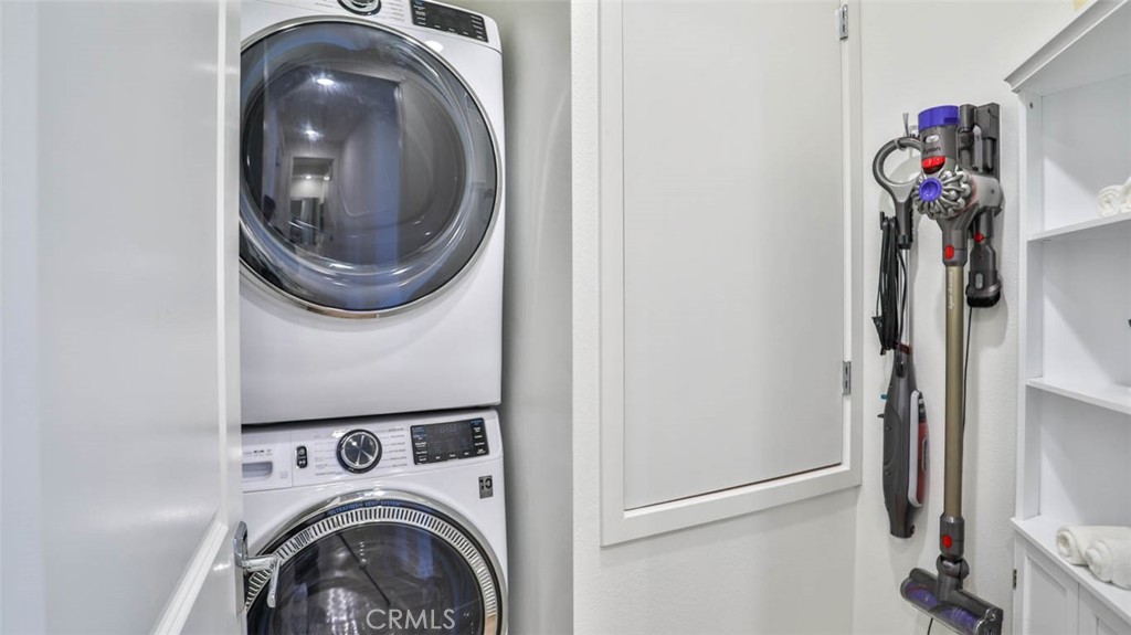 1522 Doheny Way Dana Point, CA 92629 - Photo 29 of 60 a view of storage and utility room with washer and dryer