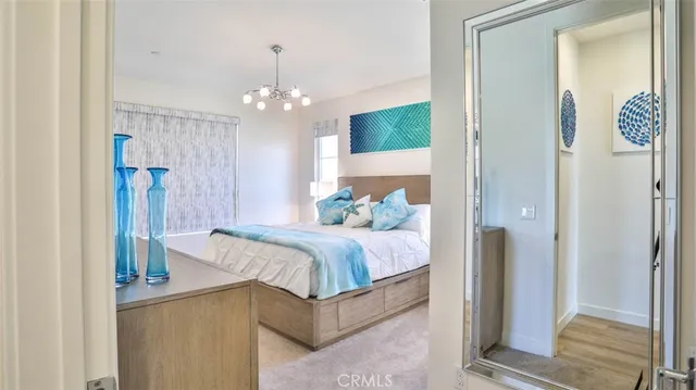 a bathroom with a double vanity sink mirror and shower