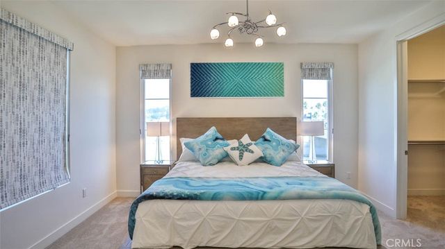 a bedroom with a bed and closet