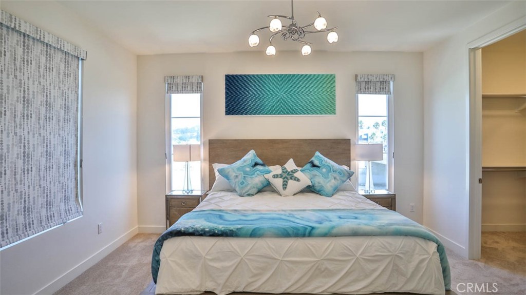 1522 Doheny Way Dana Point, CA 92629 - Photo 34 of 60 a bedroom with a bed and window