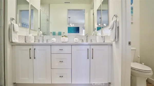 a bathroom with a sink and a toilet