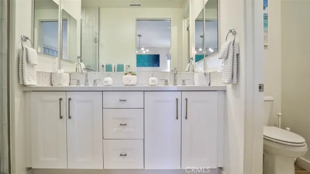 a bathroom with a sink and a toilet