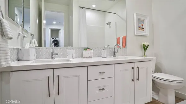 a view of a balcony with an outdoor seating