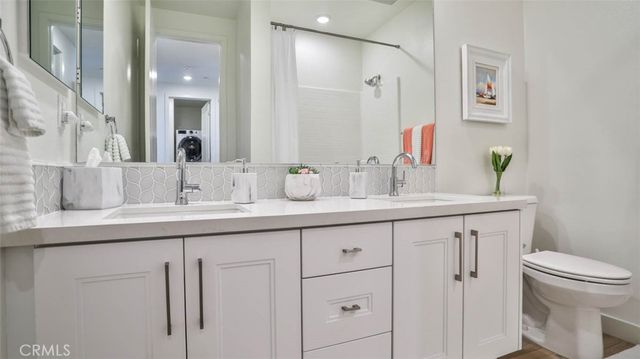 a view of a balcony with an outdoor seating