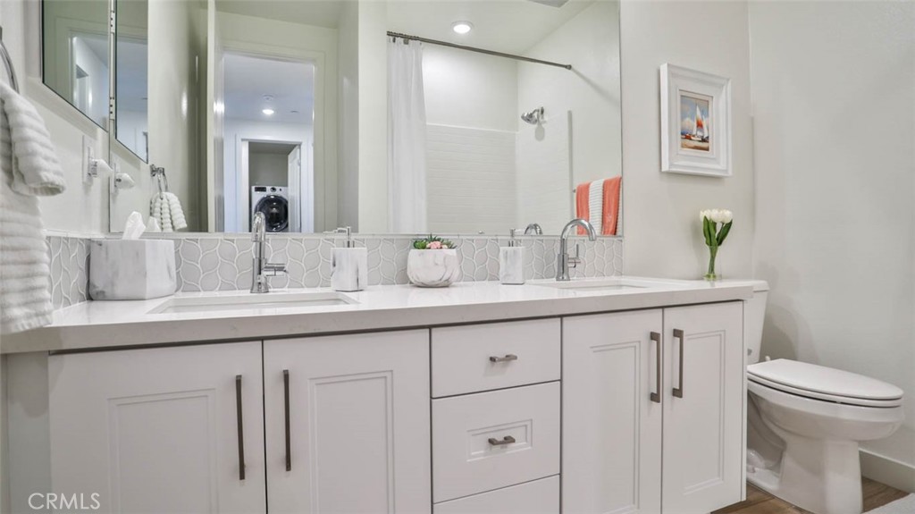 1522 Doheny Way Dana Point, CA 92629 - Photo 41 of 60 a bathroom with a sink and a toilet