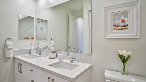 a view of a roof deck with furniture