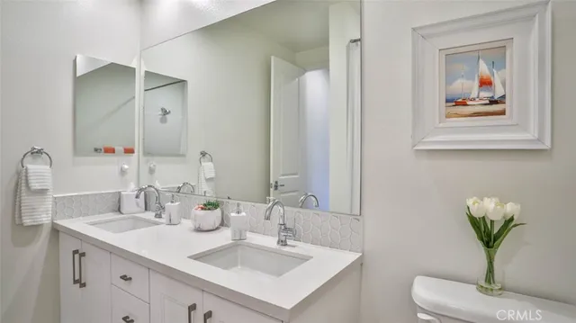 a view of a roof deck with furniture