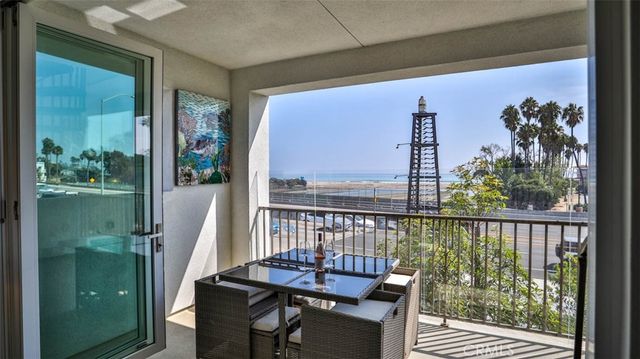 a view of roof deck with furniture