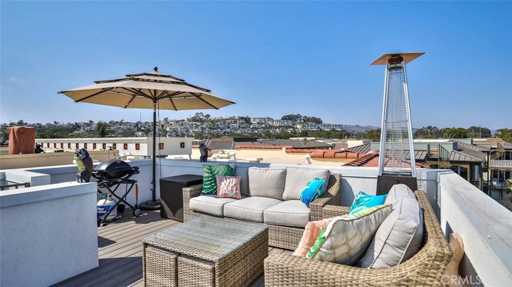 1522 Doheny Way Dana Point, CA 92629 - Photo 49 of 60 a view of a roof deck with furniture