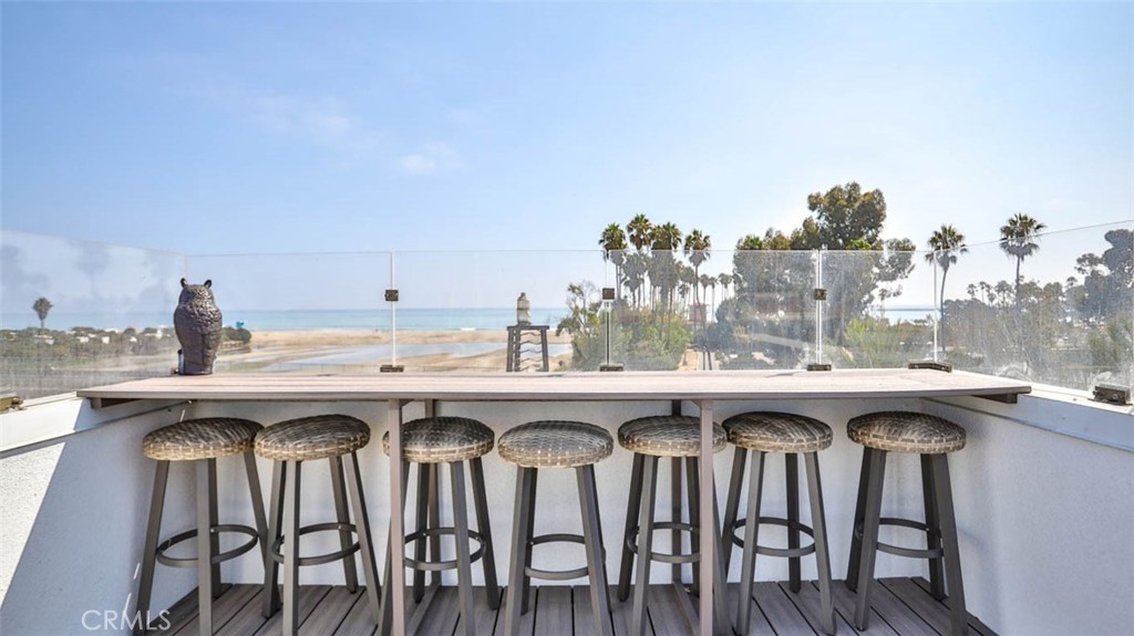 1522 Doheny Way Dana Point, CA 92629 - Photo 50 of 60 a view of a kitchen with a table and chairs