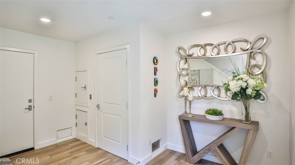1522 Doheny Way Dana Point, CA 92629 - Photo 8 of 60 a view of entryway with wooden floor