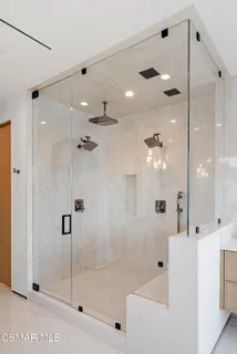 a view of a chairs and table in patio